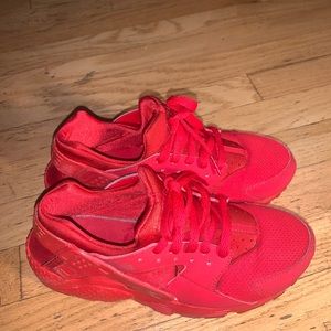Nike Huaraches in the color University Red